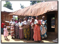 Nasenyi women outside of hut